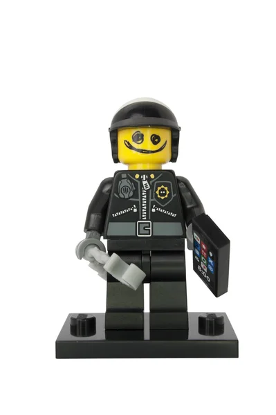 Klotter ansikte bra polis minifigur — Stockfoto