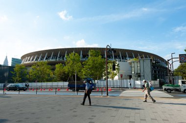 Shinjuku City, Tokyo, Japan - June 12, 2021: Japan National Stadium - Will host the opening and closing ceremonies, as well as track and field and the women's gold medal soccer game. clipart