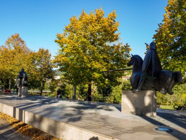 Arcos de Valdevez , Portugal; October 2020: view of the Tournament Monument on the riverside promenade in Arcos de Valdevez.