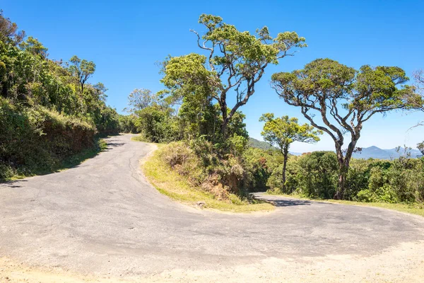 The worlds end road. The highway b512 goes up by serpentine to the Horton Plains in the Central province of Sri Lanka