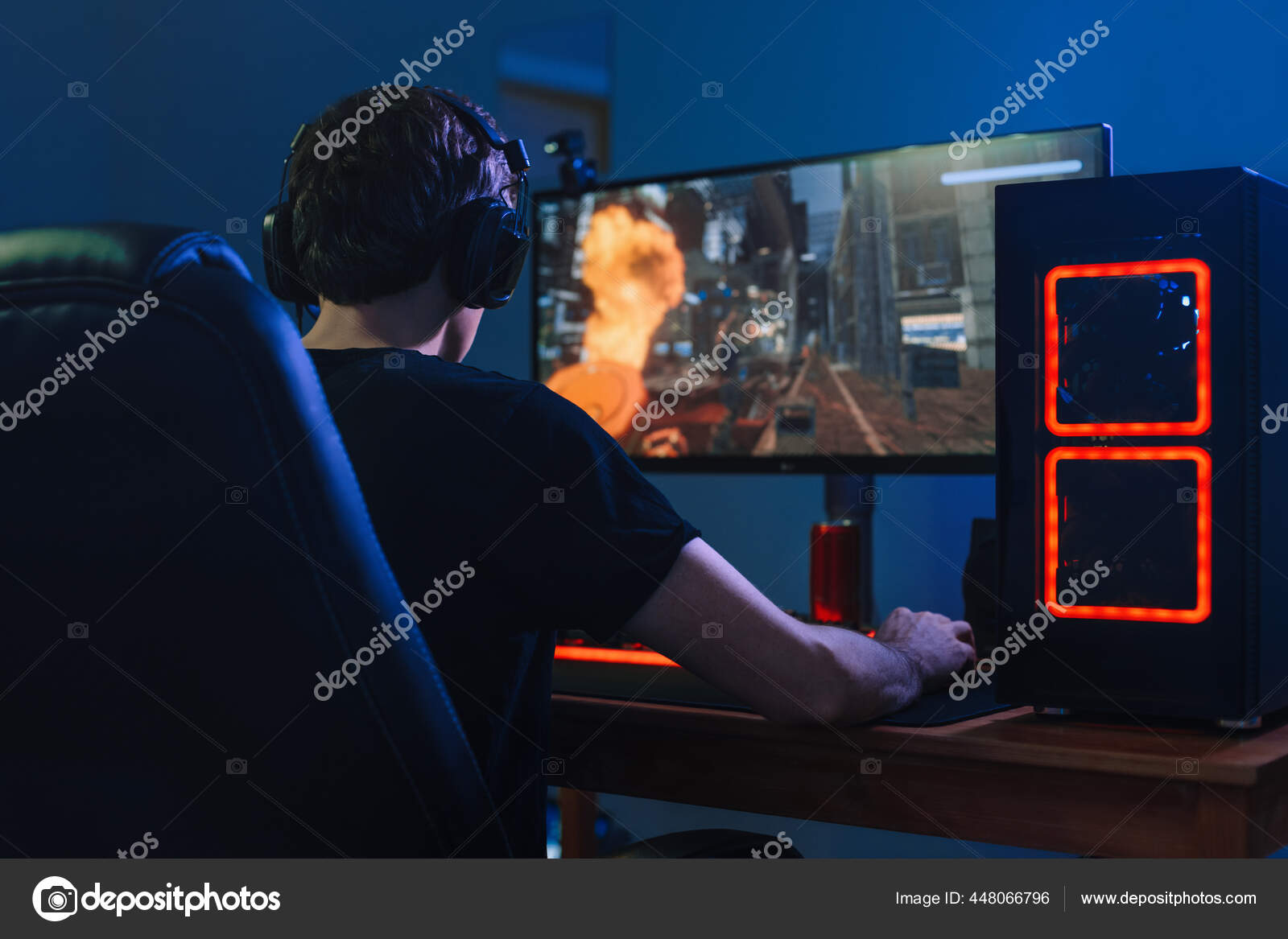 Young Professional Gamer Playing Tournaments Online Video Games Computer Headphones Stock Photo by ©iwatchwater 448066796