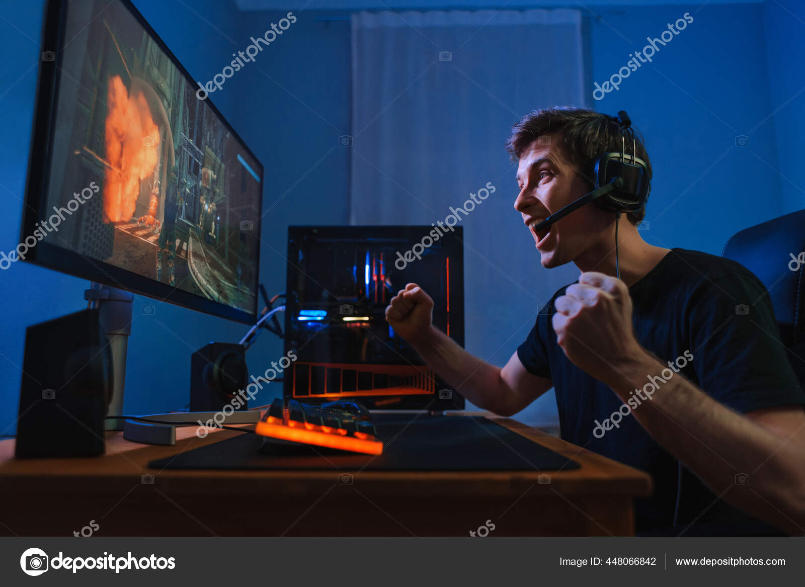 Happy professional player streaming esport tournament using microphone and  headphones, enjoying a multiplayer game. Competitive gamer playing online  video game at home. Neon color. Cyber sport concept Stock Photo