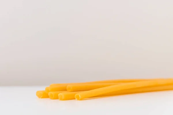 Eco-friendly pasta straws on light background — Stock Photo, Image