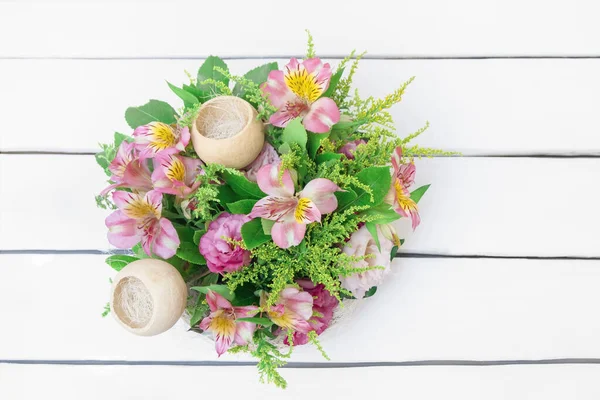 Top view of fresh flowers composition on white wooden background — Stock Photo, Image