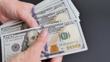 Money counting. Counting american dollars