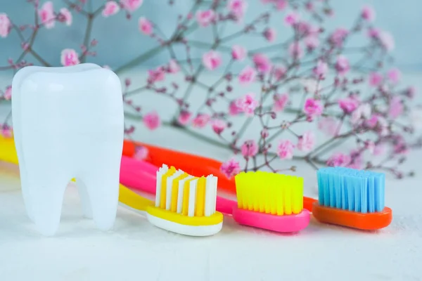 Three Bright Multi Colored Toothbrushes White Table White Figurine Tooth — Stock Photo, Image