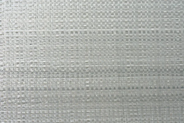 Серый цвет плетеной упаковки полиэтиленовой пены текстурированный фон — стоковое фото