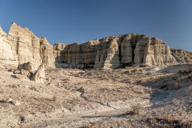 Dry streambed winds it way through a desert canyon