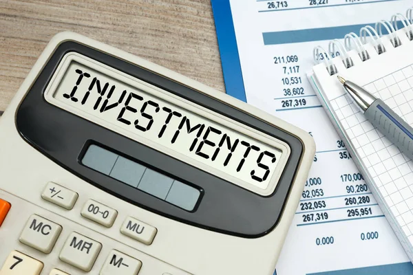 Investments Word Calculator Бизнес Налоговая Концепция — стоковое фото
