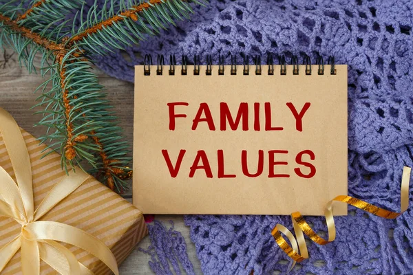 FAMILY VALUES - an inscription on a notebook, a scarf and a gift