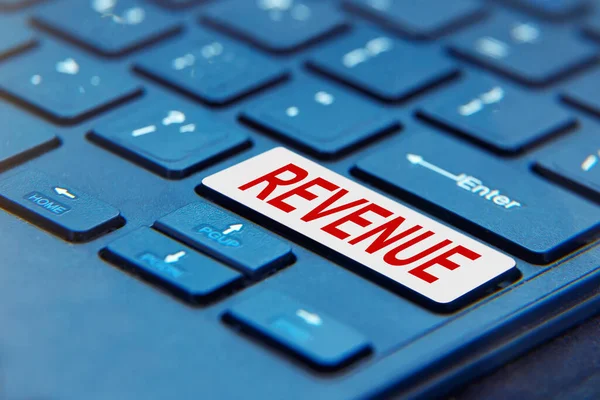 REVENUE düğmeli dizüstü bilgisayar klavyesi. Kavram, REVENUE oluşturmak için sürekli eylem anlamına gelir