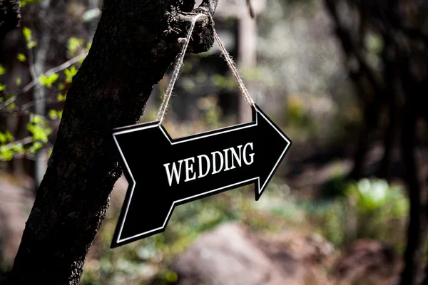 Black arrow with wedding sign