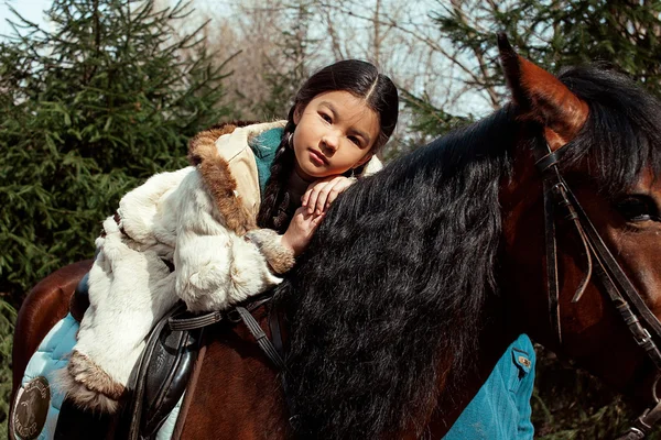 Mongolian girl with horse — Stok fotoğraf