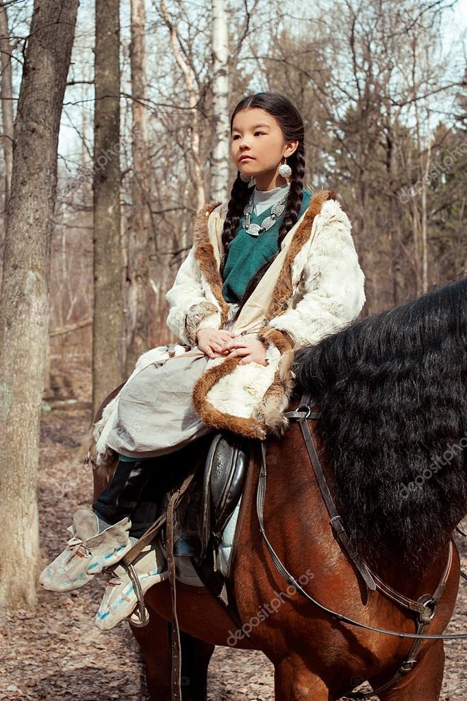 https://st2.depositphotos.com/2328815/7065/i/950/depositphotos_70656803-stock-photo-mongolian-girl-with-horse.jpg