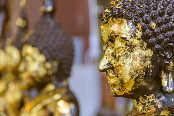 Closeup of Buddha statue gilded in the measure — Stock Photo, Image