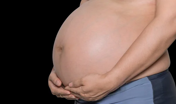 Pregnant woman with hands isolate on black background — Stock Photo, Image