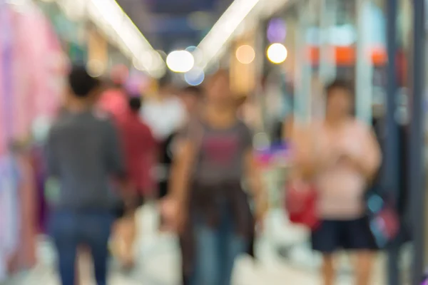 Abstract of blurred people walking in shopping centre — Stock Photo, Image