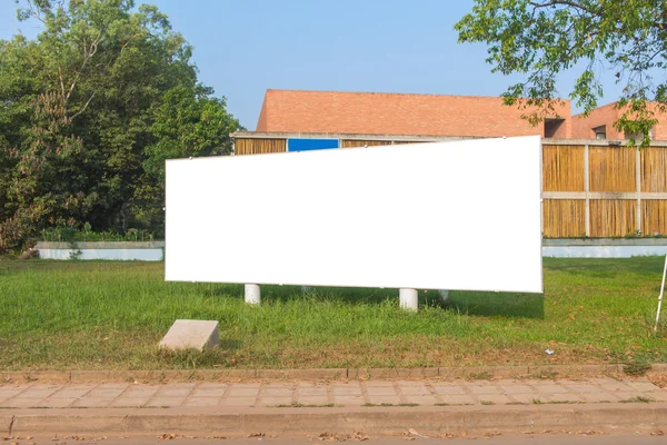 stock image blank billboard in green park field at city park zone