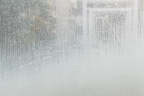 Wasserflecken an der Glaswand im Badezimmer schließen — Stockfoto