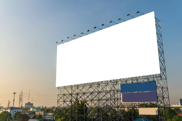 Blank billboard on road with city view background — Stock Photo, Image