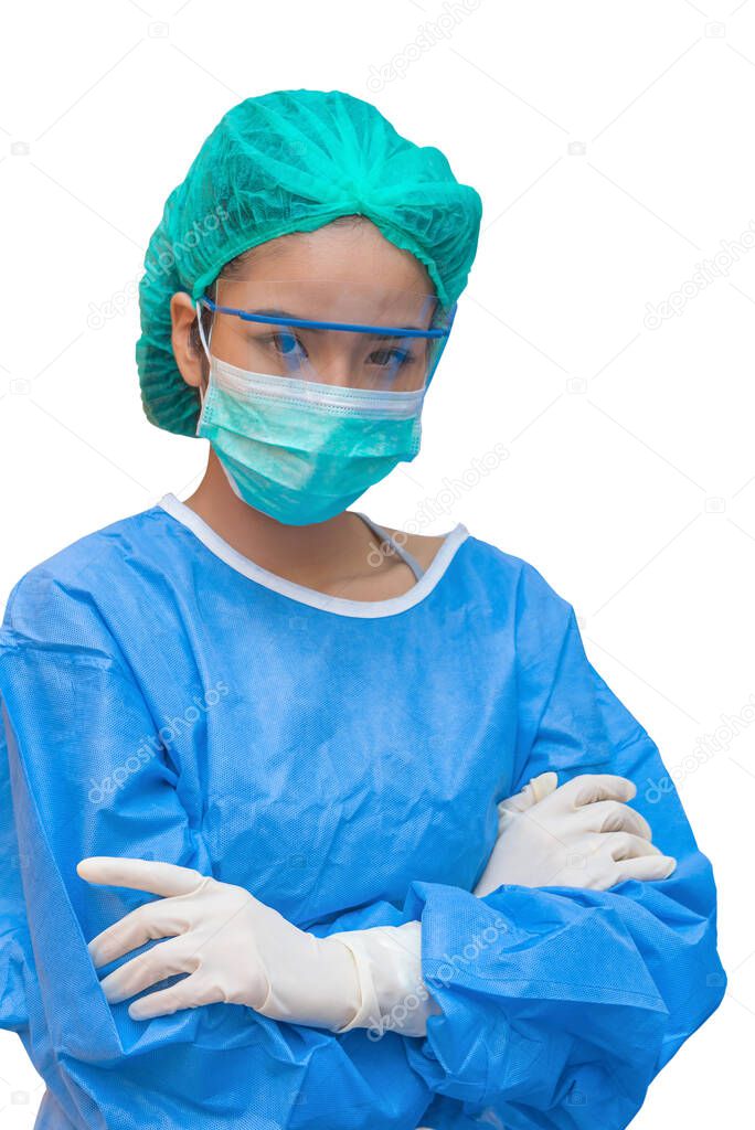 Young woman doctor or nurse in cap and face mask standing with arms folded solated on white background.