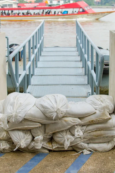 White sandbags for flood defense — Stock Photo, Image