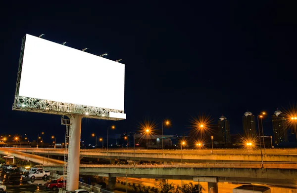 Blank billboard at night for advertisement — Stock Photo, Image