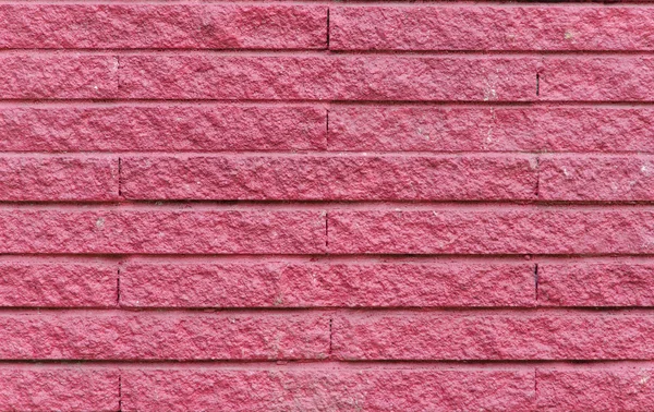 背景のピンク セメントれんが造りの壁 — ストック写真