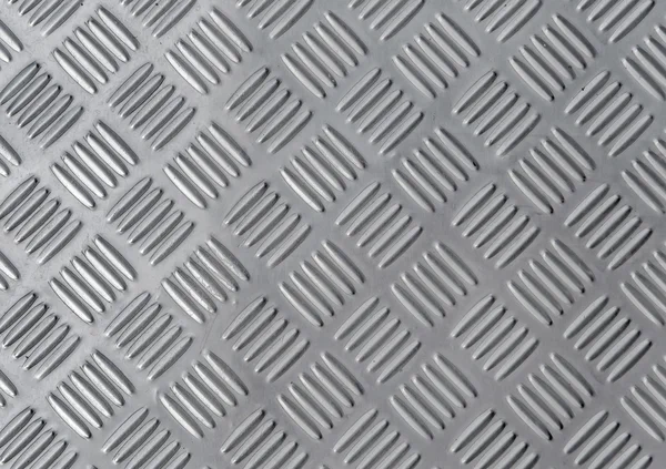 Lista escura de alumínio com formas de losango — Fotografia de Stock