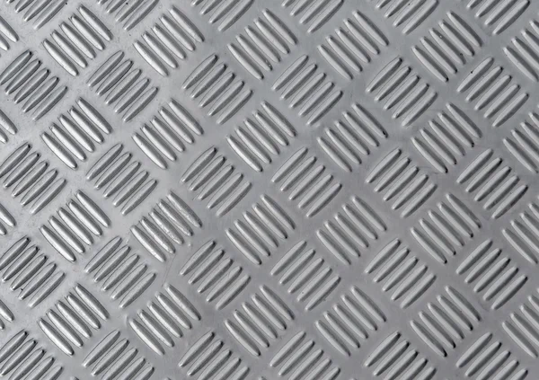 Aluminium dark list with rhombus shapes — Stock Photo, Image