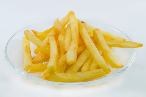 Pommes im Gericht auf weißem Hintergrund — Stockfoto