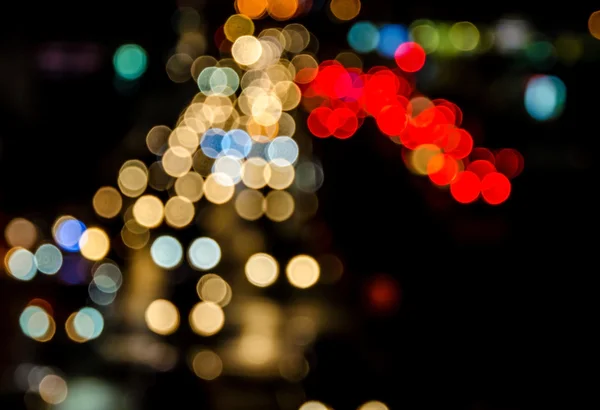 Abstém bokeh borrão de engarrafamento da noite na estrada na cidade — Fotografia de Stock