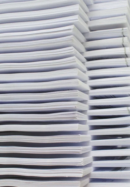 Pile of documents on desk stack up high waiting to be managed — Stock Photo, Image