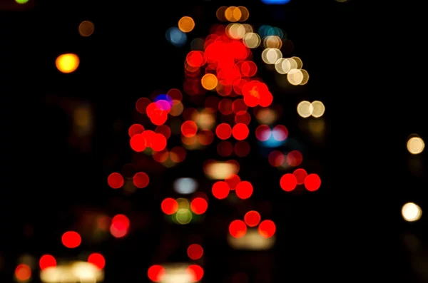 Desenfoque de movimiento, tráfico nocturno en la carretera en la ciudad — Foto de Stock