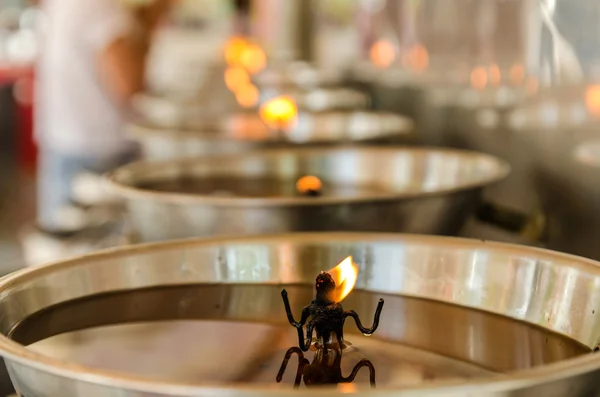 Burning candles in temple — Stock Photo, Image