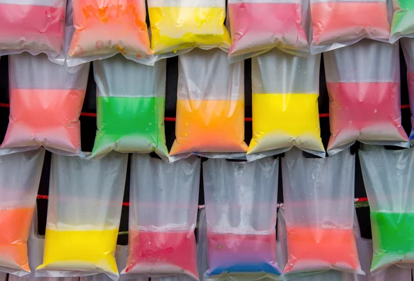 Arka plan için plastik torbaya renkli su — Stok fotoğraf
