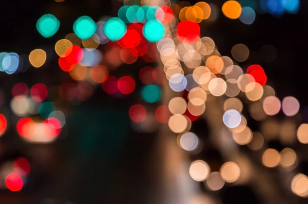 Abstém bokeh borrão de engarrafamento da noite na estrada na cidade — Fotografia de Stock