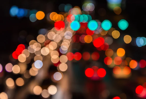 Abstém bokeh borrão de engarrafamento da noite na estrada na cidade — Fotografia de Stock