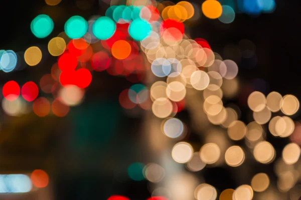 Abstém bokeh borrão de engarrafamento da noite na estrada na cidade — Fotografia de Stock