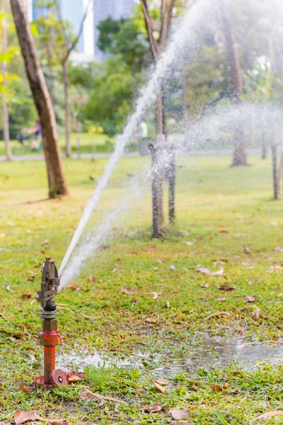 Water Sprinkler in public park — Stock Photo, Image