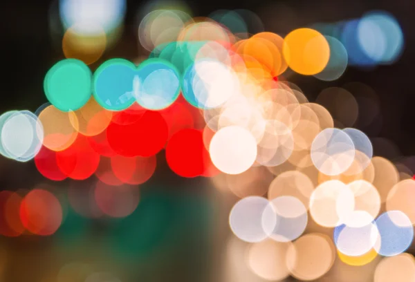 Abstém bokeh borrão de engarrafamento da noite na estrada na cidade — Fotografia de Stock