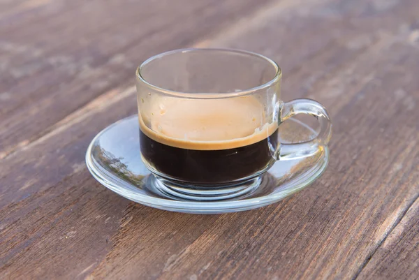 Cup of espresso on woodentable background — Stock Photo, Image