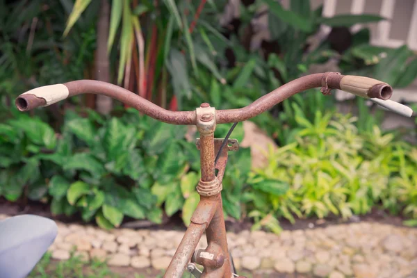 Old bicycle and handlebars in public park vintage style — Stock Photo, Image