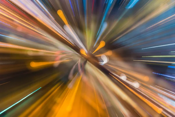 Abstracte circulaire van lichte auto's bokeh in stad bij nacht — Stockfoto