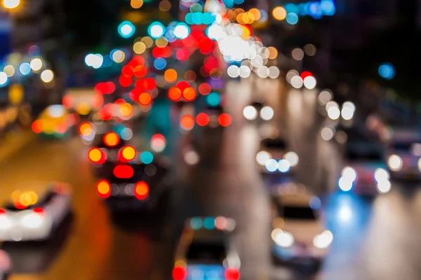 Abstact blur bokeh of Evening traffic jam on road in city — Stock Photo, Image