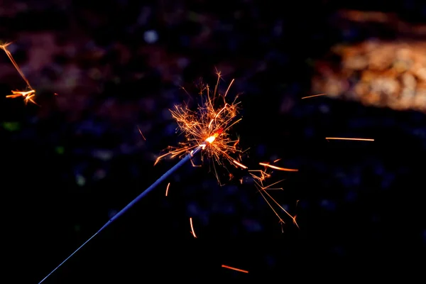 Hand holding a sparkler fire — Stock Photo, Image