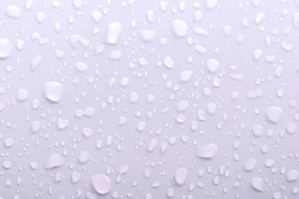 Gocce d'acqua su sfondo bianco — Foto Stock