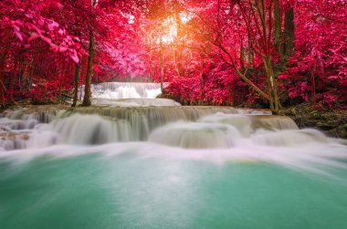 Waterfall in deep rain forest jungle (Huay Mae Kamin Waterfall i clipart