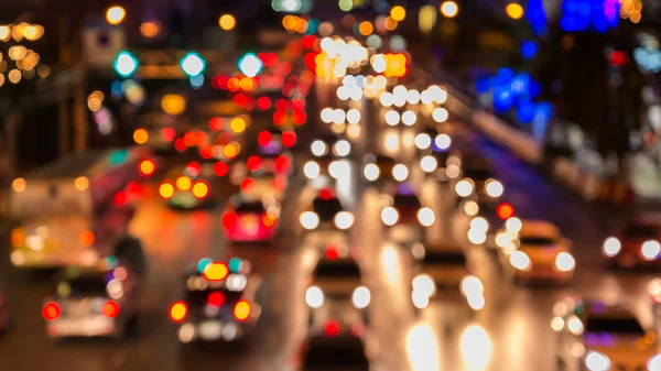 Abstact blur bokeh of Evening traffic jam on road in city — Stock Photo, Image