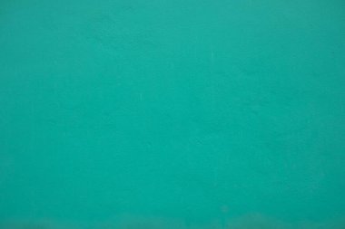 Mavi turkuaz duvar arka planının dokusu. Mimarlık ve iç tasarım materyali.